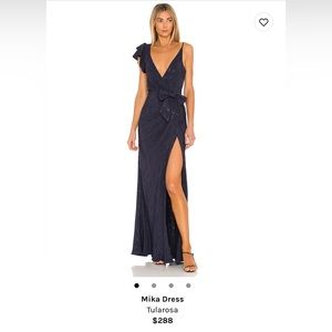 Navy blue beautiful dress from Tularosa, currently sold out on revolve.
